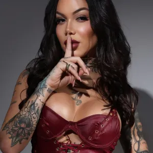 Scarlet tattooed